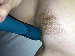 Wife masturbates trimmed bush pussy with vibrator