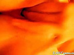 Then she zoom the cam to her wet pussy and starts to finger it from behind as well as from front and then shows her hard nipples while pinching them. Then she starts to masturbate while fingering her wet pussy.