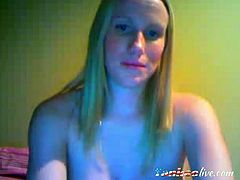 A beautiful blonde milf displays her very pregnant belly and big boobies to her webcam viewers.