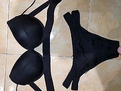 Pissing over sexy black panty and bra combo