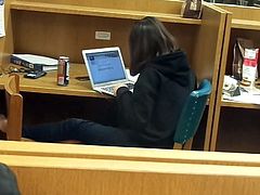 Barefoot Asian girl studying for finals