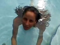 Funny handjob inside swimming pool