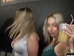 Natural boobed brunette on her knees giving one of the male dancers a deepthroat blowjob, while behind her is another brunette with a tattoo and a very nice round bubble butt, getting fucked hard from behind for a creampie.
