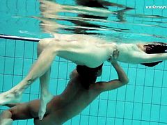 Lesbian fun underwater and naked stripping