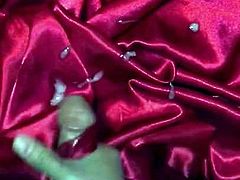 Cum in red satin sheet