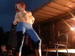 Amateur stripper at a bike show
