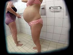 pregnant french milf in pool shower bikini