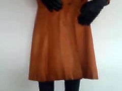 red leather skirt and brown leather coat