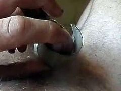 Cock Torture with impressions in glans of spiked hood.