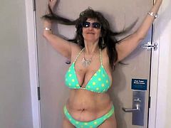 Tinja Expands A Green Polka Dot Bikini