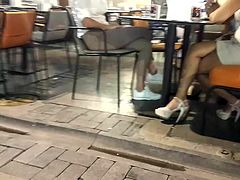 sexy crossed legs high heels under table