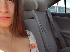 Lady flashes in the back of the Uber ride