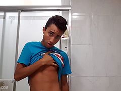 Lucas Prescott is jerking off in the bathroom, and once again we have the pleasure of watching this Latin twink stroke his uncut monster. At first he stands to give us some great profiles of his huge cock. Then Lucas moves to the floor for a hot perspective, while beating his meat. Then he delivers the much anticipated cum shot, in the most convenient location to clean up the mess hes made.