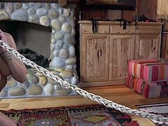 He plows her pussy and face so deep with his big cock. He is going hard and fast as he rams her mouth. The vibrator on her pussy makes her knees shake. This is hardcore and very rough sex out in the cabin.