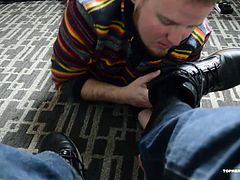 Salt Lake Foot Man, of Xtube fame, provides a full service foot cleaning from boots, to socks and toes. Topher Phoenix cant help but moan as Salt Lake Foot Man literally worships the ground he walks on. Topher leaves a boot print, spits on the man, and talks down to him, making sure Salt Lake Foot Man is not able to pleasure himself until his job is finished.