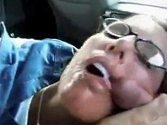 Horny MILF get facial in car