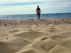 Nude man on a french nudist beach