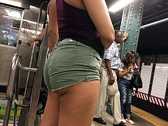 Latina Booty Cheeks in Green Jean Shorts