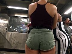 Latina Booty Cheeks in Green Jean Shorts
