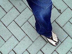 black toenail polish and black platform flip flops