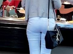 Candid Voyeur MILF in tight white jeans
