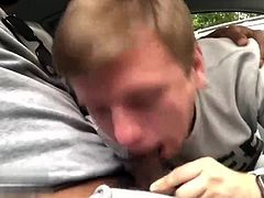 Deepthroating big uncut Russian cock in the car