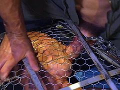 We have a gay stud inside the bondage cage and another horny stud as the master. Looks like the executor is locked his minion in this kinky device, as well as chastised his cock too. Gay bondage with intense SM & hardcore sex with hot studs.