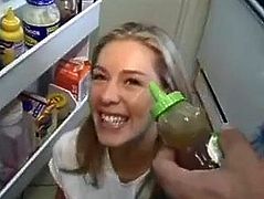 Blonde makes a hot blowjob in the kitchen