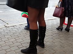 Black pantyhose in miniskirt