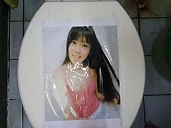 pissing on printed pic #2