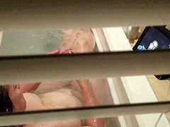Spying on Debbie Juggs taking bath