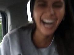 Cute teen pisses in a moving car