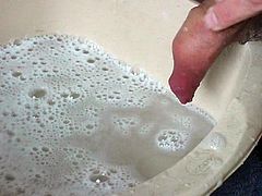 Foreskin washing in a bowl