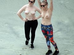 Two hot teens get their photos taken, topless!