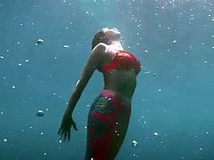 Nina Dobrev sexy in a bikini and as a mermaid