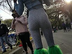 Mardi Gras Creep Shots ebony thot in a bodysuit showing ass