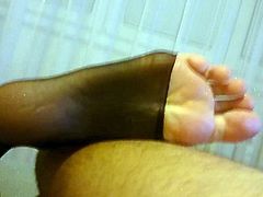 Footjob- black nylon feet, long toes
