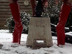 EXTREME HIGH RED HEELS IN SNOW AMERICAN BOMBSHELL DESTROYER