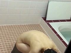 Asian MILF taking spy cam shower