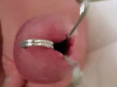 Spread urethra cumshot.