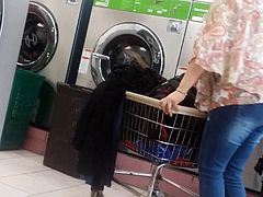 Mature latina at the laundromat