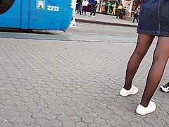 Girl wait for tram 13 black pantyhose