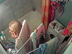 Hidden Cam of two sisters, younger in the shower