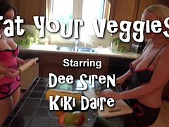 Dee Siren and Kiki Daire plan on making a nice, healthy dinner!!! Once we see the veggies for the salad, we get a little excited over their nice big sizes. Kiki & I get really naughty and fuck all the veggies including a nice big squash in my pussy & one in her ass! We end up making our own 
