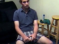 At first, this 19 year old freckled Irish straight boy seems unsure of what to expect, but he soon tunes into the porn video and works his dick thru his shorts. Ace pulls off his shirt and boxers and out pops a 9.5 inch baseball bat sized cock. He uses both hands to bring himself to the edge and then shoots a massive cum load.