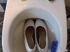 Piss in white high heels