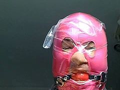 masked Male bagged and locked struggling