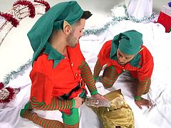 This is a Christmas story about how two naughty elves peeped into a Santa's bag without a demand and stole a very strange gift... It's amazing that these slutty guys know how to use this kinky sex toy. Watch how Santa will punish them after he discovers what they have done... Hot interracial threesome at its best!