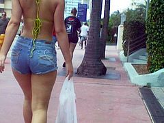 Check out this perfect girl walking down the street wearing tight shorts that let us witness her perfect booty in candid footage