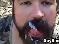 Strong guy sucking his mans cock in the great outdoors